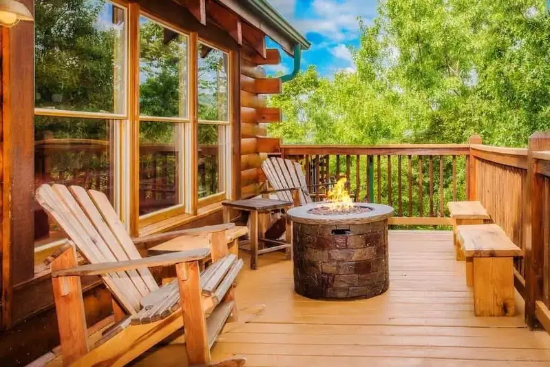 fire pit on deck of pet friendly cabin