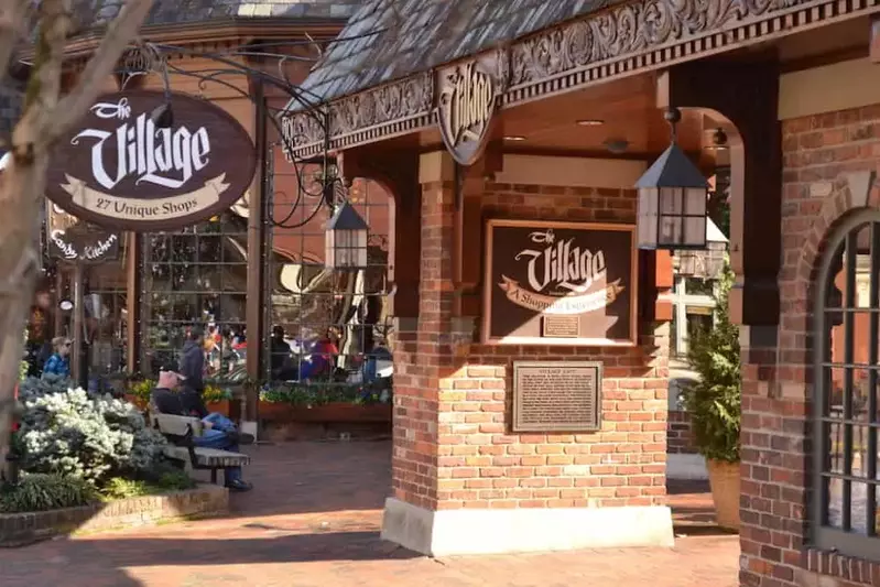 the village shops entrance with sign in gatlinburg tennessee