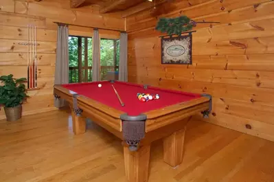 pool table in one of the 4 bedroom cabins in gatlinburg tn