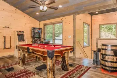 cabin with a game room